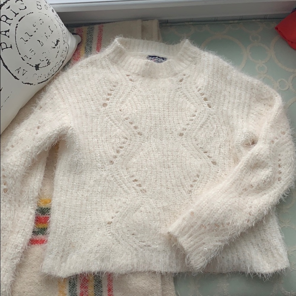 white sweater